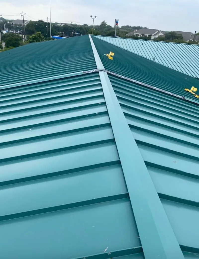 Green commercial metal roof ridge and valley for Metal Roof Repair in Stanton